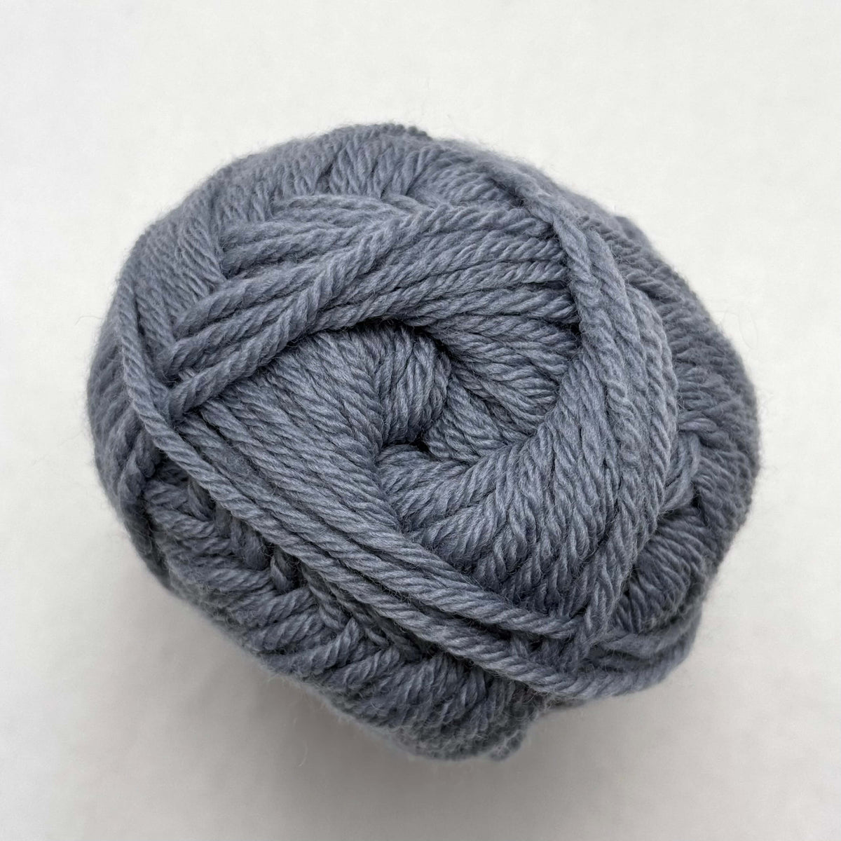 A linen blue ball of Sandnes Garn Double Sunday yarn