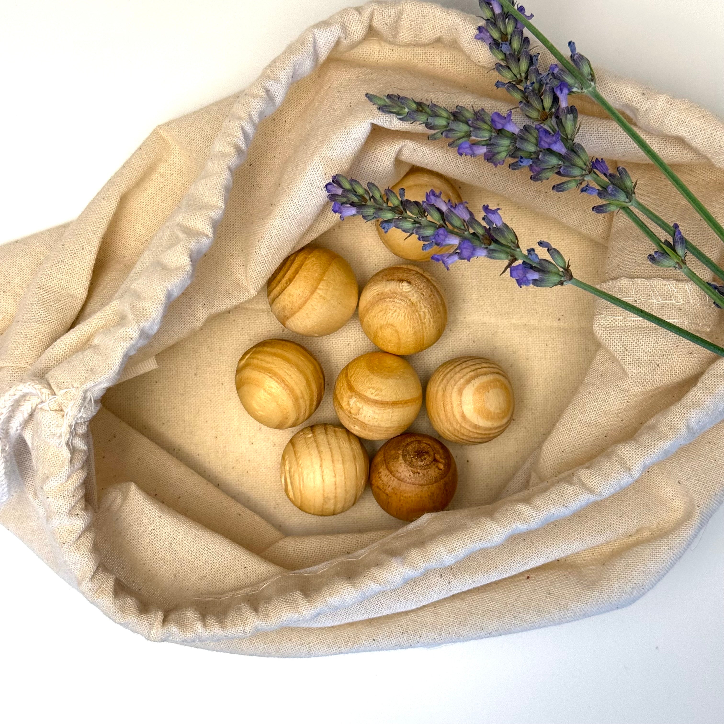 Eight cedar moth balls in a cotton drawstring bag with lavender