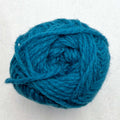 A petrol blue ball of Sandnes Garn Fritidsgarn yarn